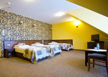 Фото номера Трехместный номер Отель Hotel Odessa г. Wysokie Mazowieckie 11